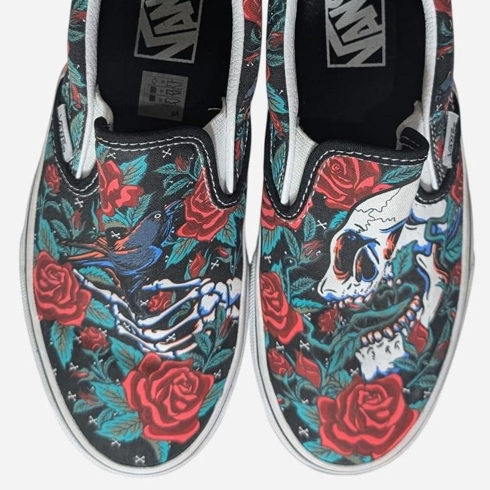VANS Unisex Black/Rose Skulls Slip-On Skateboarding Shoe VNOA7Q5D6BT, Women's 7